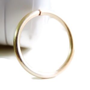 Gold seamless hoop for piercings